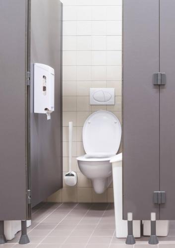 Offentligt toilet med børste